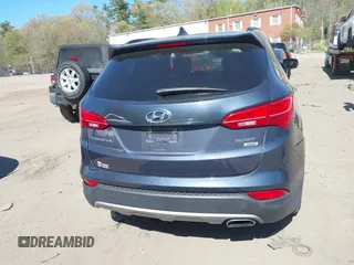 2014 Hyundai Santa Fe z VIN 5XYZUDLB1EG165458, wystawiony jako IAAI lot #42107789 z przebiegiem 94 395 mil mil oraz . Historia ofert i sprzedaży dostępna na DreamBid. Obrazek 16.