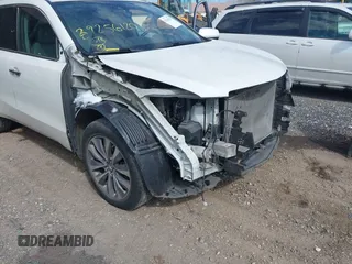 2016 Acura MDX w/Tech with VIN 5FRYD4H43GB014801, listed as a IAAI auction lot 39256120 with 73,769 mi miles. Bid and sale history available at carsss.com. Image 6.