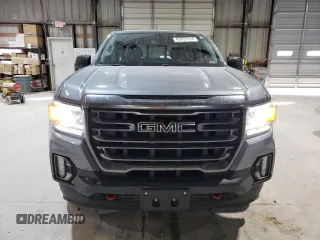 2022 GMC Canyon 4WD AT4 w/Leather with VIN 1GTG6FEN1N1175900, listed as a Copart auction lot 85957514 with 56,811 mi miles and Salvage Title. Bid and sale history available at carsss.com. Image 5.