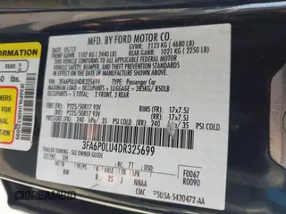 2013 Ford Fusion SE Hybrid with VIN 3FA6P0LU4DR325699, listed as a IAAI auction lot 41677237 with 129,004 mi miles. Bid and sale history available at carsss.com. Image 9.