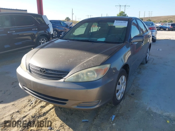 2004 Toyota Camry LE with VIN 4T1BE32KX4U916477, listed as a IAAI auction lot 42018299 with 149,247 mi miles. Bid and sale history available at carsss.com. Image 2.