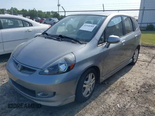 2008 Honda Fit Sport with VIN JHMGD386X8S058659, listed as a IAAI auction lot 42168584 with 210,589 mi miles. Bid and sale history available at carsss.com. Image 2.