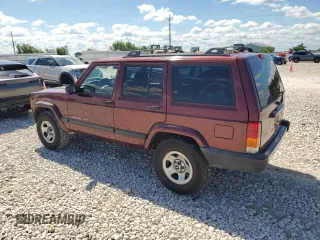2001 Jeep Cherokee Sport with VIN 1J4FT48S21L538823, listed as a Copart auction lot 56385885 with 157,808 mi miles and Clean title. Bid and sale history available at DreamBid. Image 2.