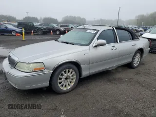 2003 Lincoln Town Car Signature z VIN 1LNHM82W73Y606016, wystawiony jako Copart lot #54817205 z przebiegiem 195 326 mil mil oraz Szkoda całkowita • Salvage title. Historia ofert i sprzedaży dostępna na DreamBid. Obrazek 1.
