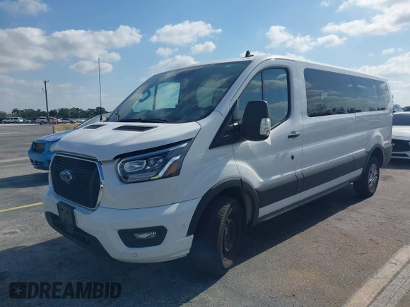 2023 Ford Transit Passenger XL with VIN 1FBAX2YG6PKB08879, listed as a IAAI auction lot 42137671 with 44,204 mi miles. Bid and sale history available at carsss.com. Image 2.