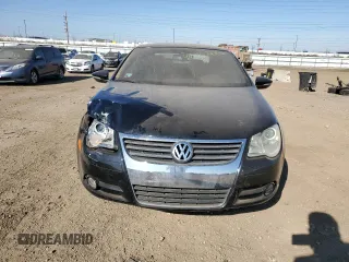 2009 Volkswagen Eos Lux с VIN WVWFA71F99V011940, выставлен на аукционе Copart как лот 48558885 с пробегом 75 242 миль миль и Списание • Salvage title. История ставок и продаж доступна на DreamBid. Изображение 5.