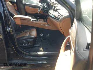 2017 BMW X6 xDrive50i with VIN 5UXKU6C54H0S99557, listed as a IAAI auction lot 41484943 with 1 mi miles. Bid and sale history available at carsss.com. Image 5.