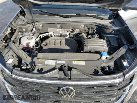 2024 Volkswagen Atlas SE with VIN 1V2DE2CA3RC244772, listed as a Copart auction lot 81523574 with 7,369 mi miles and Salvage title. Bid and sale history available at DreamBid. Image 12.