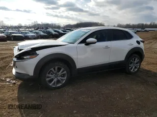 2021 Mazda CX-30 Preferred with VIN 3MVDMACL0MM216112, listed as a Copart auction lot 83617634 with 71,371 mi miles and Salvage Title. Bid and sale history available at carsss.com. Image 1.