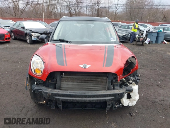 2013 MINI Cooper Countryman with VIN WMWZB3C57DWM07565, listed as a IAAI auction lot 41655938 with 62,694 mi miles. Bid and sale history available at carsss.com. Image 12.