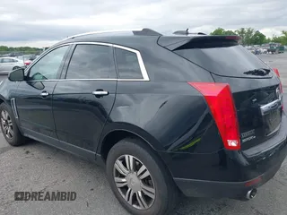 2015 Cadillac SRX Luxury Collection z VIN 3GYFNEE34FS510360, wystawiony jako IAAI lot #42343737 z przebiegiem 149 046 mil mil oraz . Historia ofert i sprzedaży dostępna na DreamBid. Obrazek 19.
