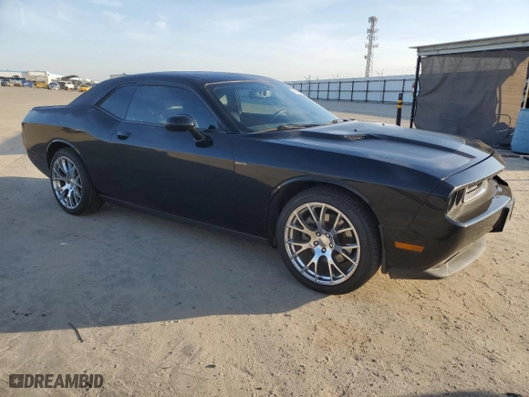2012 Dodge Challenger SXT Plus with VIN 2C3CDYAG7CH217397, listed as a Copart auction lot 48550045 with 108,025 mi miles and Salvage Title. Bid and sale history available at carsss.com. Image 4.