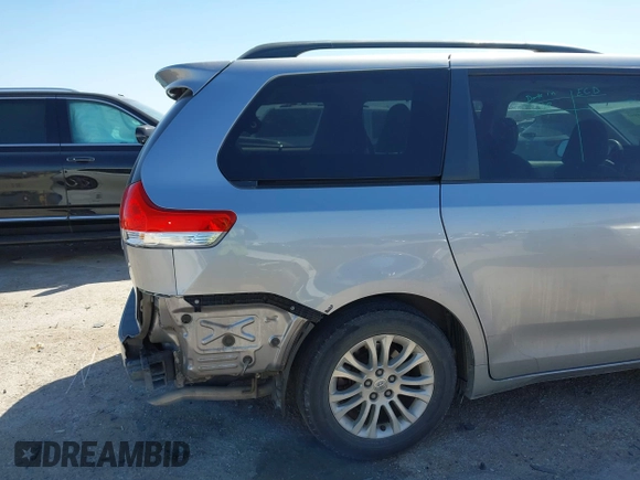 2011 Toyota Sienna XLE AAS with VIN 5TDYK3DCXBS172586, listed as a IAAI auction lot 41835992 with 203,599 mi miles. Bid and sale history available at carsss.com. Image 6.