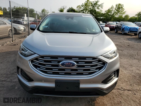 2021 Ford Edge Titanium with VIN 2FMPK4K91MBA12380, listed as a Copart auction lot 59275785 with 82,295 mi miles and Salvage title. Bid and sale history available at DreamBid. Image 5.
