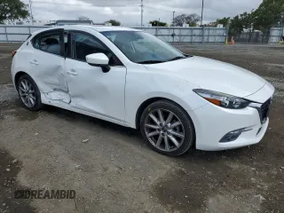 2017 Mazda 3 Grand Touring with VIN JM1BN1M37H1116869, listed as a Copart auction lot 51706765 with 86,334 mi miles and Salvage Title. Bid and sale history available at DreamBid. Image 4.