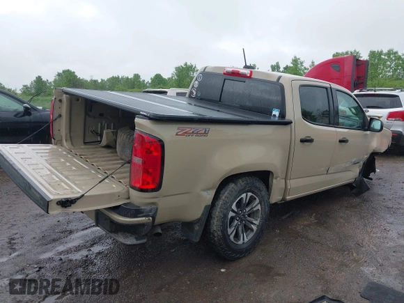 2022 Chevrolet Colorado 4WD Z71 with VIN 1GCGTDEN1N1249703, listed as a IAAI auction lot 42422767 with 73,524 mi miles and . Bid and sale history available at DreamBid. Image 4.