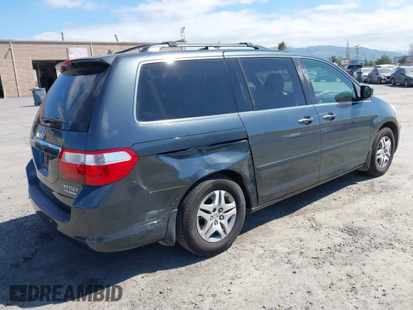 2005 Honda Odyssey TOURING with VIN 5FNRL38885B082482, listed as a IAAI auction lot 41879897 with 159,667 mi miles. Bid and sale history available at carsss.com. Image 4.