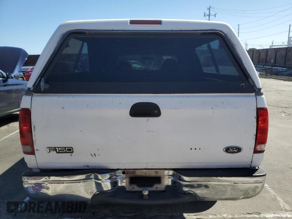 2000 Ford F-150 XL with VIN 1FTZX172XYNC01869, listed as a Copart auction lot 47414095 with 0 mi miles and Salvage Title. Bid and sale history available at carsss.com. Image 6.