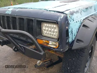1997 Jeep Cherokee SE z VIN 1J4FJ28S3VL573144, wystawiony jako IAAI lot #41965201 z przebiegiem 298 276 mil mil oraz . Historia ofert i sprzedaży dostępna na DreamBid. Obrazek 20.