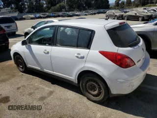 2007 Nissan Versa 1.8 S with VIN 3N1BC13E57L439319, listed as a Copart auction lot 72720894 with 103,738 mi miles and Salvage Title. Bid and sale history available at carsss.com. Image 2.