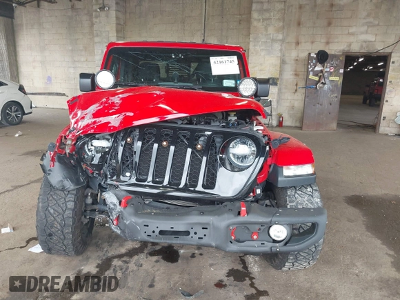 2021 Jeep Gladiator Willys with VIN 1C6HJTAG7ML602130, listed as a IAAI auction lot 42161745 with 49,576 mi miles and . Bid and sale history available at DreamBid. Image 13.