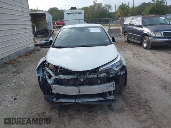 2018 Toyota C-HR XLE with VIN JTNKHMBX3J1010211, listed as a IAAI auction lot 40799443 with 104,148 mi miles. Bid and sale history available at carsss.com. Image 13.