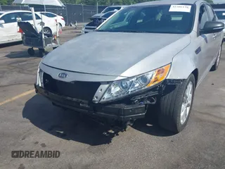 2013 Kia Optima EX with VIN 5XXGN4A75DG092276, listed as a IAAI auction lot 42306138 with 201,649 mi miles and . Bid and sale history available at DreamBid. Image 6.