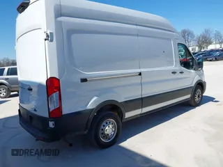 2023 Ford Transit Cargo with VIN 1FTBR2X86PKA51393, listed as a IAAI auction lot 41769269 with 91,032 mi miles and . Bid and sale history available at DreamBid. Image 4.