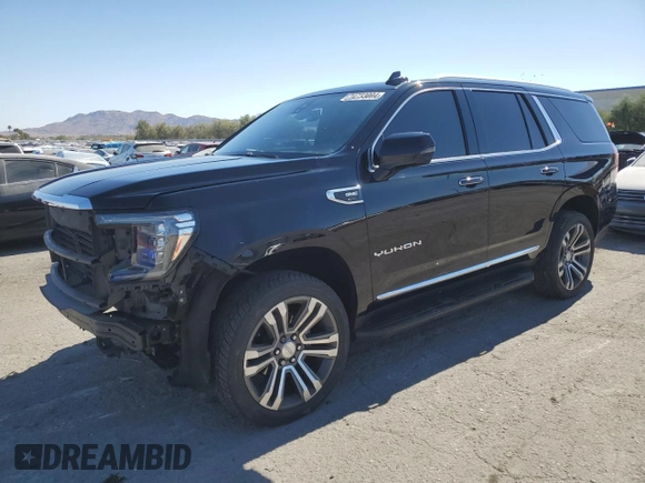 2021 GMC Yukon SLT with VIN 1GKS1BKDXMR119990, listed as a Copart auction lot 74733094 with 73,597 mi miles and Salvage Title. Bid and sale history available at carsss.com. Image 1.