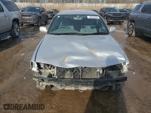 1999 Toyota Corolla с VIN AE1000286393, выставлен на аукционе Copart как лот 42634225 с пробегом 80 160 миль миль и Чистый • Clean title. История ставок и продаж доступна на DreamBid. Изображение 5.