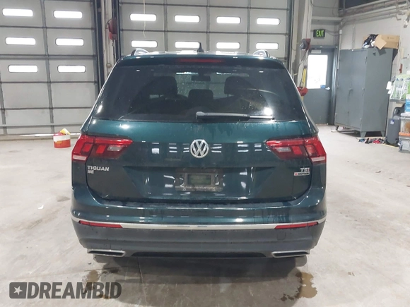 2018 Volkswagen Tiguan SEL with VIN 3VV2B7AX8JM113976, listed as a IAAI auction lot 42310576 with 100,319 mi miles and . Bid and sale history available at DreamBid. Image 16.