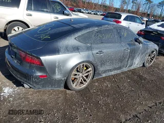 2016 Audi S7 z VIN WAUW2AFCXGN031858, wystawiony jako IAAI lot #41182675 z przebiegiem Nie podano mil oraz . Historia ofert i sprzedaży dostępna na DreamBid. Obrazek 4.