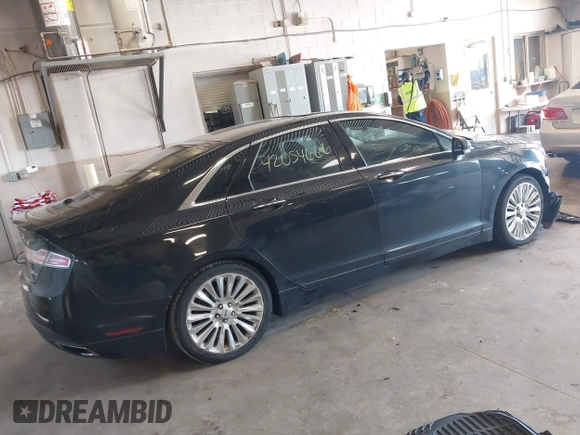 2013 Lincoln MKZ z VIN 3LN6L2G94DR823887, wystawiony jako IAAI lot #42054666 z przebiegiem 101 866 mil mil oraz . Historia ofert i sprzedaży dostępna na DreamBid. Obrazek 4.