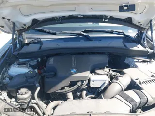2015 BMW X1 xDrive28i with VIN WBAVL1C59FVY31385, listed as a IAAI auction lot 41900768 with 136,116 mi miles. Bid and sale history available at carsss.com. Image 10.