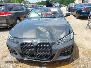 2021 BMW 4 Series M440i with VIN WBA53AT05MCG89665, listed as a IAAI auction lot 42319456 with Not provided miles and . Bid and sale history available at DreamBid. Image 12.