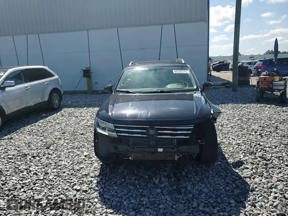 2018 Volkswagen Tiguan SEL с VIN 3VV2B7AX1JM066581, выставлен на аукционе Copart как лот 60535175 с пробегом 57 809 миль миль и Списание • Salvage title. История ставок и продаж доступна на DreamBid. Изображение 15.