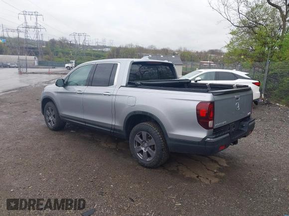 2020 Honda Ridgeline RTL-E with VIN 5FPYK3F73LB004365, listed as a IAAI auction lot 41965887 with 80,981 mi miles and . Bid and sale history available at DreamBid. Image 3.