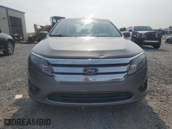 2010 Ford Fusion SE z VIN 3FAHP0HA2AR364858, wystawiony jako Copart lot #60855075 z przebiegiem 184 403 mil mil oraz Szkoda całkowita • Salvage title. Historia ofert i sprzedaży dostępna na DreamBid. Obrazek 5.