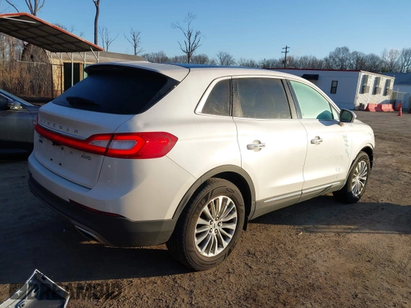 2018 Lincoln MKX Select z VIN 2LMPJ8KR5JBL48639, wystawiony jako IAAI lot #41640923 z przebiegiem 124 834 mil mil oraz . Historia ofert i sprzedaży dostępna na DreamBid. Obrazek 4.