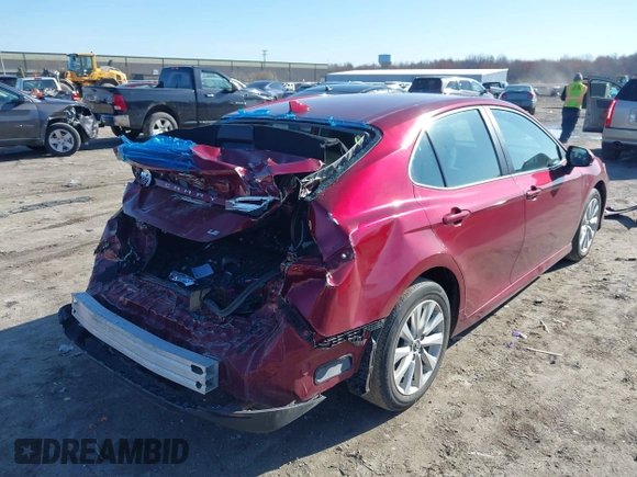 2019 Toyota Camry LE with VIN 4T1B11HK1KU233345, listed as a IAAI auction lot 41971136 with 51,499 mi miles and . Bid and sale history available at DreamBid. Image 4.