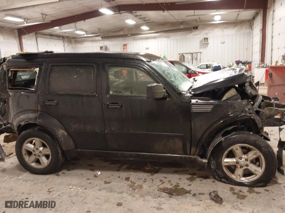 2010 Dodge Nitro SXT with VIN 1D4PU5GK4AW126578, listed as a IAAI auction lot 41545180 with 203,078 mi miles. Bid and sale history available at carsss.com. Image 13.