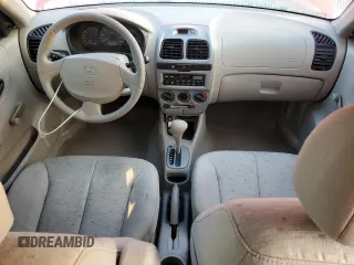 2005 Hyundai Accent GLS with VIN KMHCG45C15U596671, listed as a Copart auction lot 74834004 with 0 mi miles and Salvage Title. Bid and sale history available at carsss.com. Image 8.
