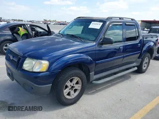 2005 Ford Explorer Sport Trac XLS z VIN 1FMZU67K05UB36386, wystawiony jako IAAI lot #42449876 z przebiegiem 161 181 mil mil oraz . Historia ofert i sprzedaży dostępna na DreamBid. Obrazek 2.
