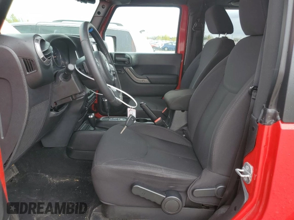 2014 Jeep Wrangler Sport with VIN 1C4AJWAG1EL143206, listed as a Copart auction lot 51167695 with 100,734 mi miles and Salvage Title. Bid and sale history available at carsss.com. Image 7.
