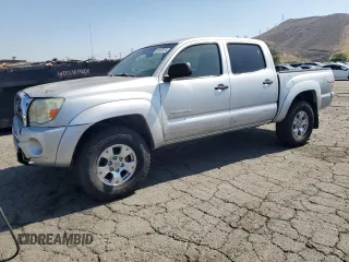 2005 Toyota Tacoma PreRunner with VIN 5TEJU62N75Z079243, listed as a Copart auction lot 61020815 with 152,405 mi miles and Salvage title. Bid and sale history available at DreamBid. Image 1.