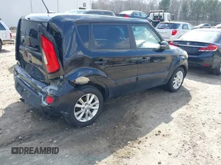 2012 Kia Soul + with VIN KNDJT2A69C7410074, listed as a IAAI auction lot 41798938 with 246,559 mi miles. Bid and sale history available at carsss.com. Image 4.