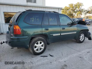 2005 GMC Envoy SLT with VIN 1GKDS13S652329610, listed as a Copart auction lot 76384914 with Not Provided miles and Salvage Title. Bid and sale history available at DreamBid. Image 3.