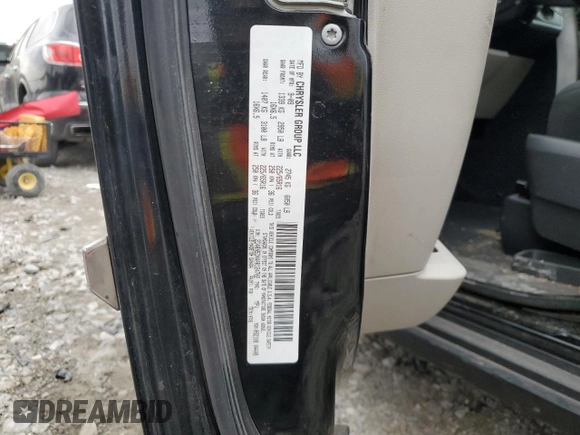 2010 Dodge Grand Caravan SXT with VIN 2D4RN5DX4AR124702, listed as a Copart auction lot 51654365 with 231,910 mi miles and Salvage Title. Bid and sale history available at DreamBid. Image 13.