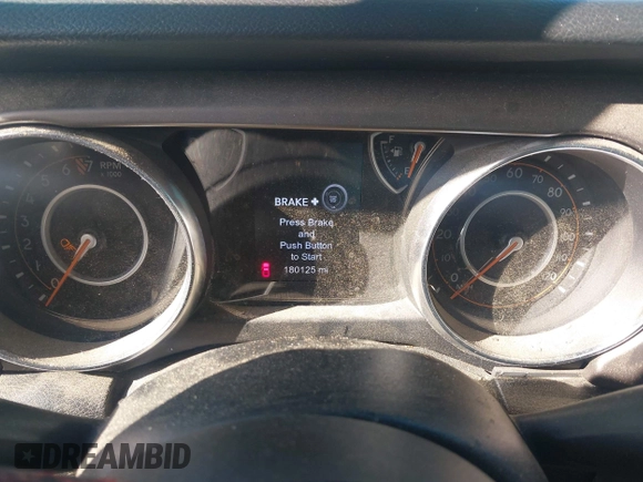 2020 Jeep Gladiator Sport S with VIN 1C6HJTAG0LL216406, listed as a IAAI auction lot 41991629 with 180,125 mi miles and . Bid and sale history available at DreamBid. Image 15.