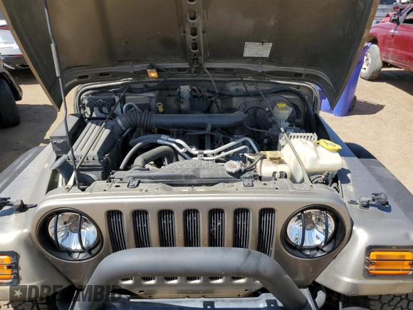 2004 Jeep Wrangler Rubicon with VIN 1J4FA69S64P751349, listed as a Copart auction lot 69642624 with 160,589 mi miles and Salvage Title. Bid and sale history available at carsss.com. Image 11.